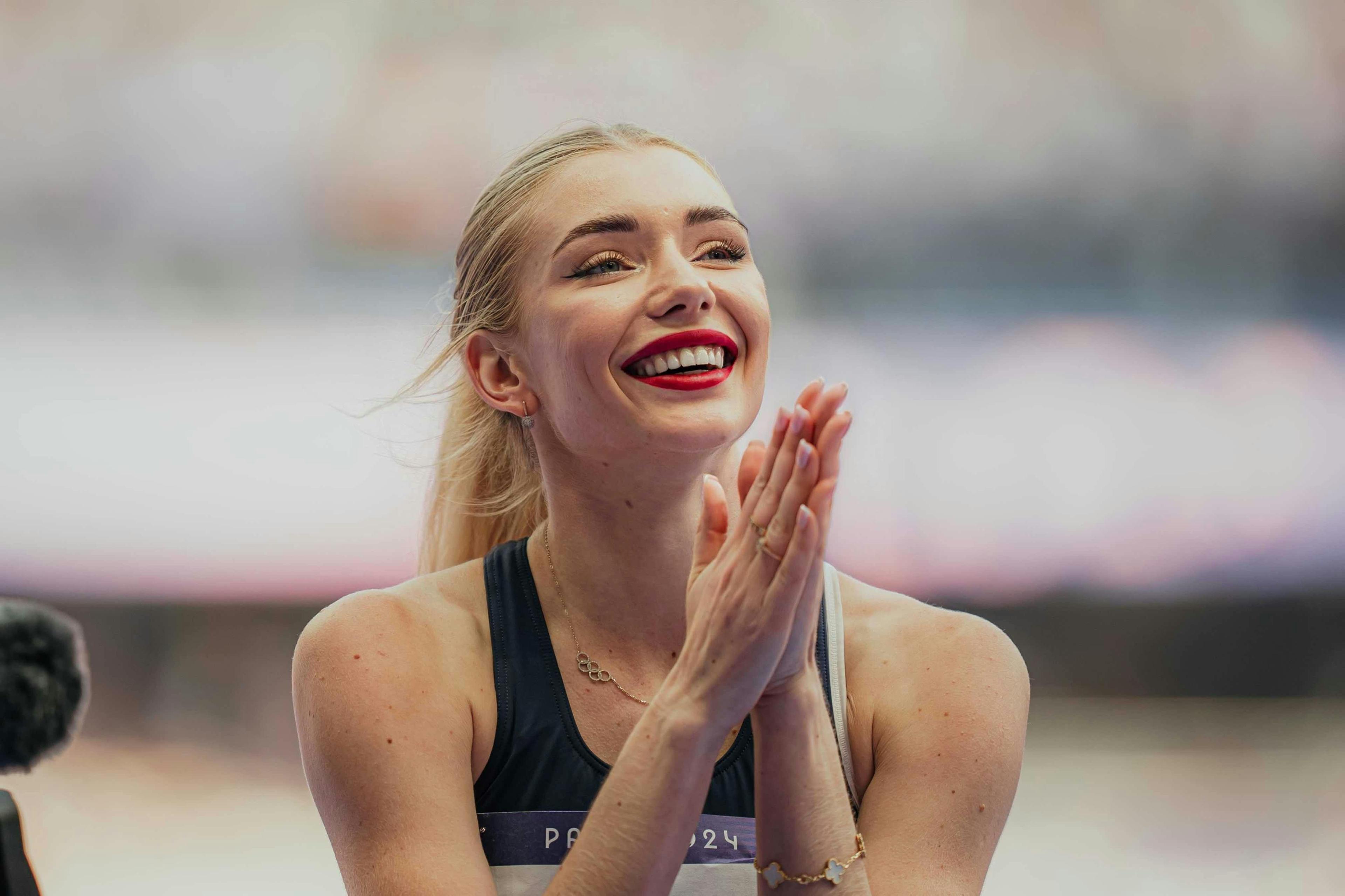 head person face happy laughing adult female woman