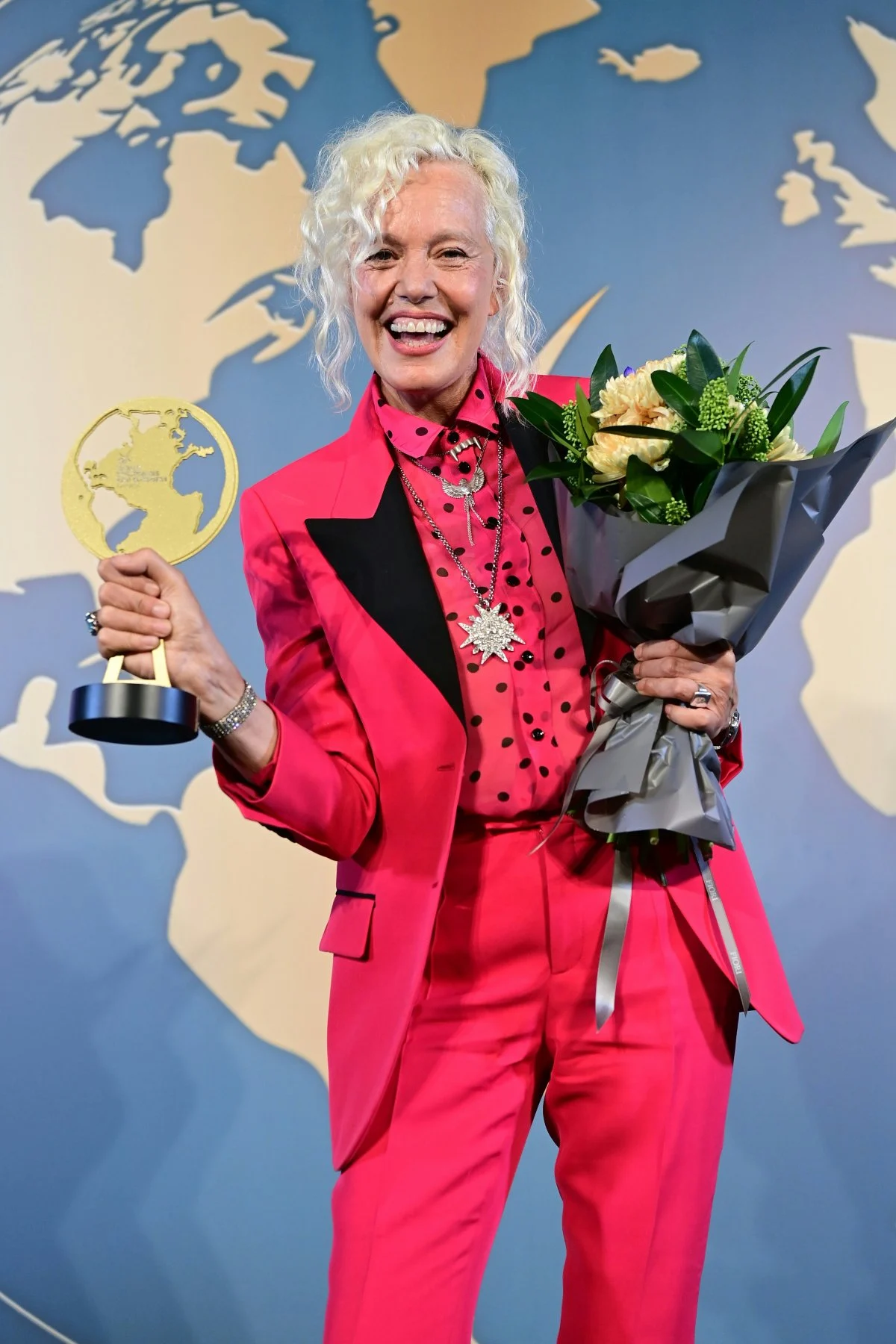 arts culture and entertainment celebrities cannes flower flower arrangement plant flower bouquet person accessories jewelry necklace ring finger