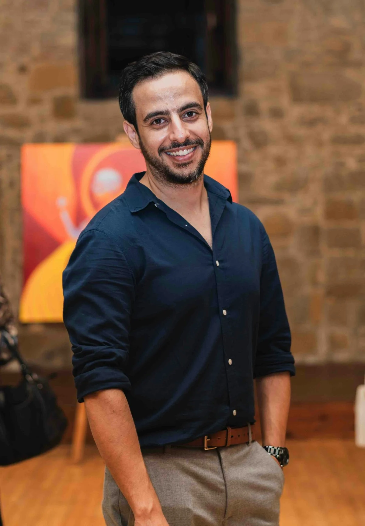 face head person smile black hair adult male man sleeve standing