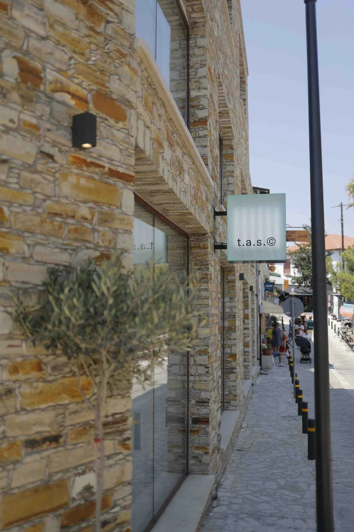 city path road street urban sidewalk walkway flagstone building brick