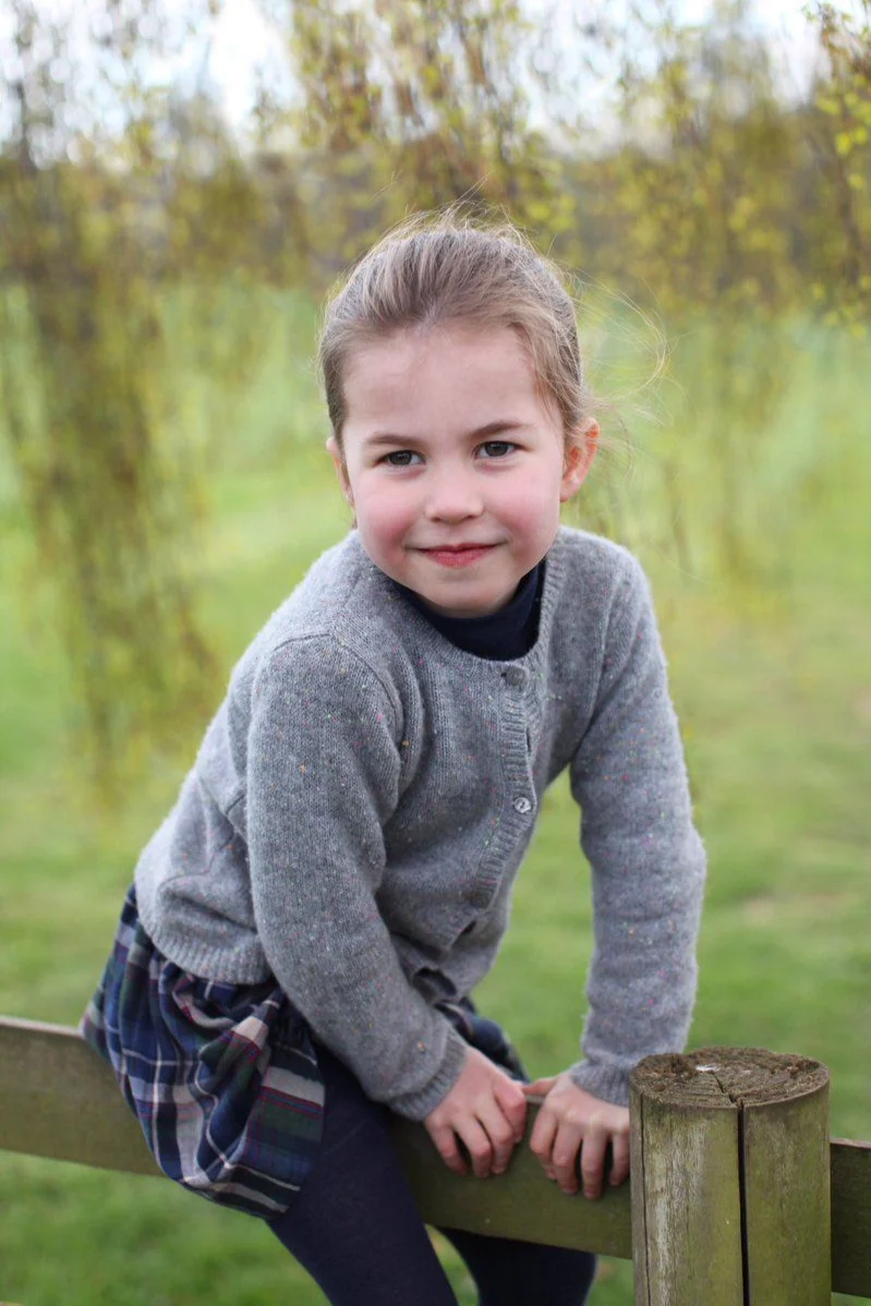 Princess Charlotte wearing a sweater in the countryside.